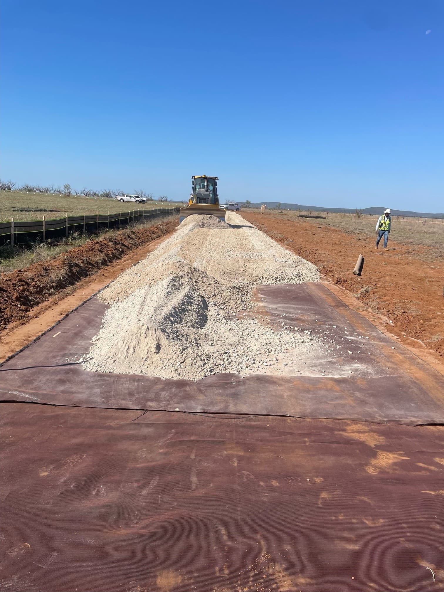 Access road construction accelerated using MIRAFI RS380i and flexible base